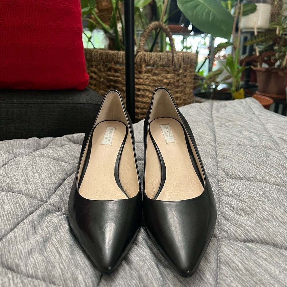 Cole Haan black pumps